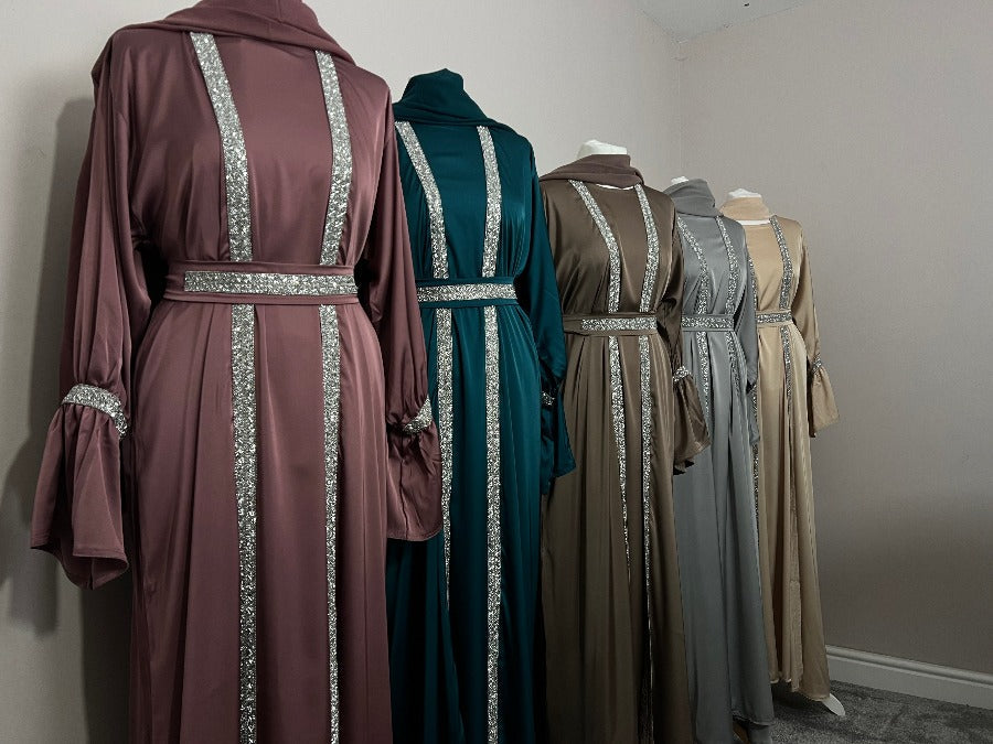 Women's Luxury Eid Abaya Sets by Dubayaluxe modest wear for women. glam abayas EID abayas